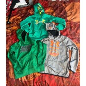 3 youth sweatshirts 2 small, 1 medium under armour & Nike